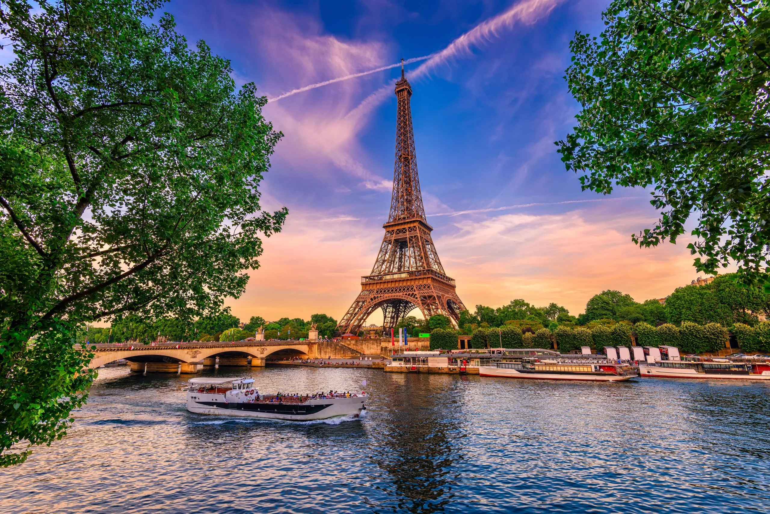 The Eiffel Tower and the Seine at sunset